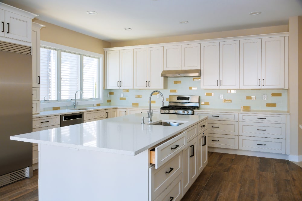 Traditional white cabinets in a classic kitchen setting, highlighting timeless elegance.