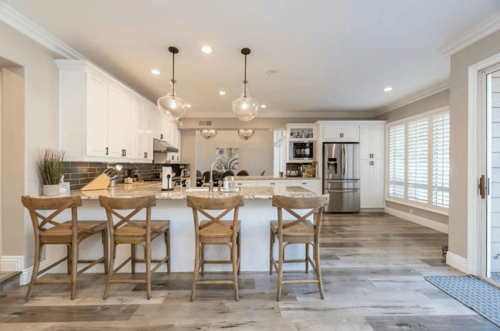 Modern kitchen renovation showcasing sleek cabinets and a spacious layout.