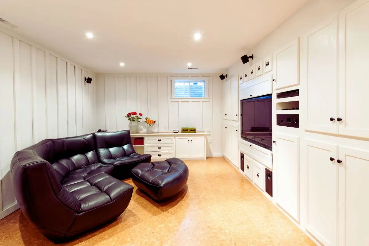 Finished basement with cabinets