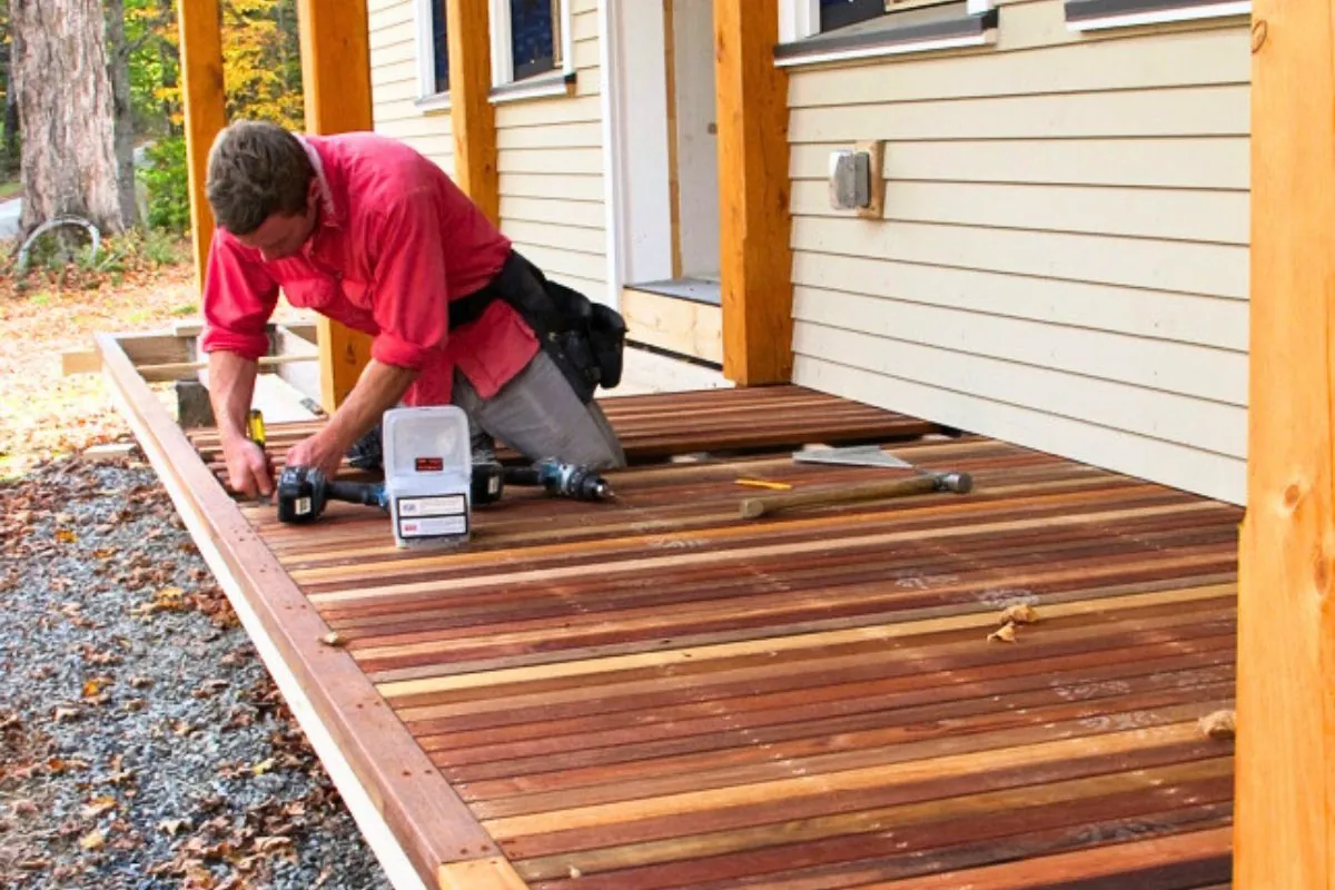 Professional contractors installing patio decks