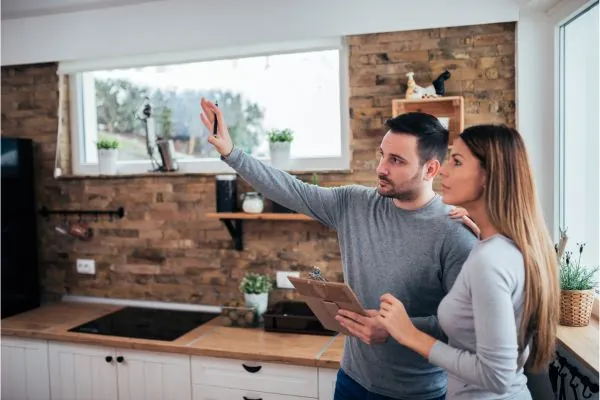 Couple talking about kitchen renovation