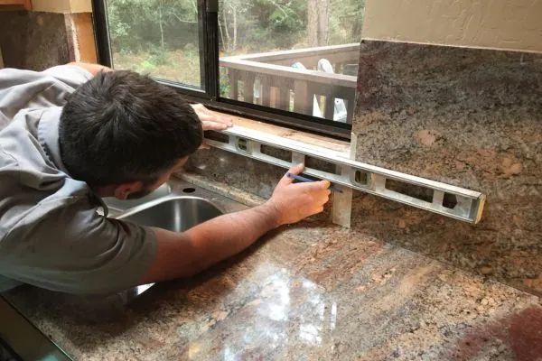 kitchen remodeler expert working in kitchen design renovation