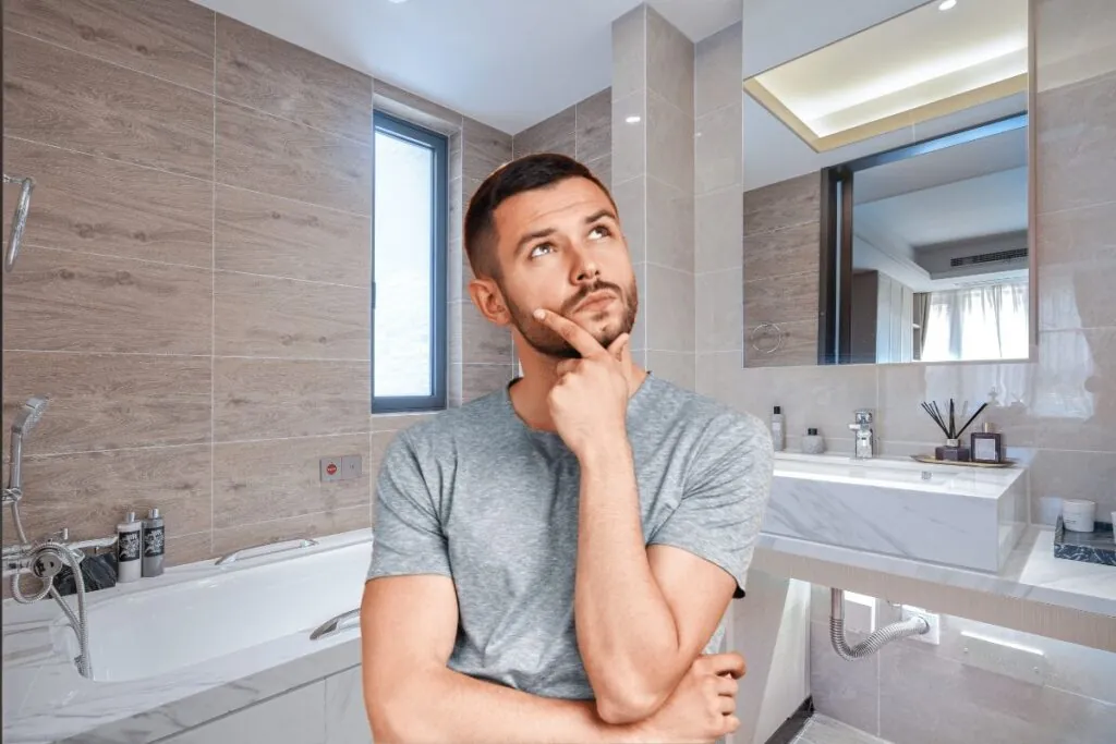 a man thinking of bathroom remodeling